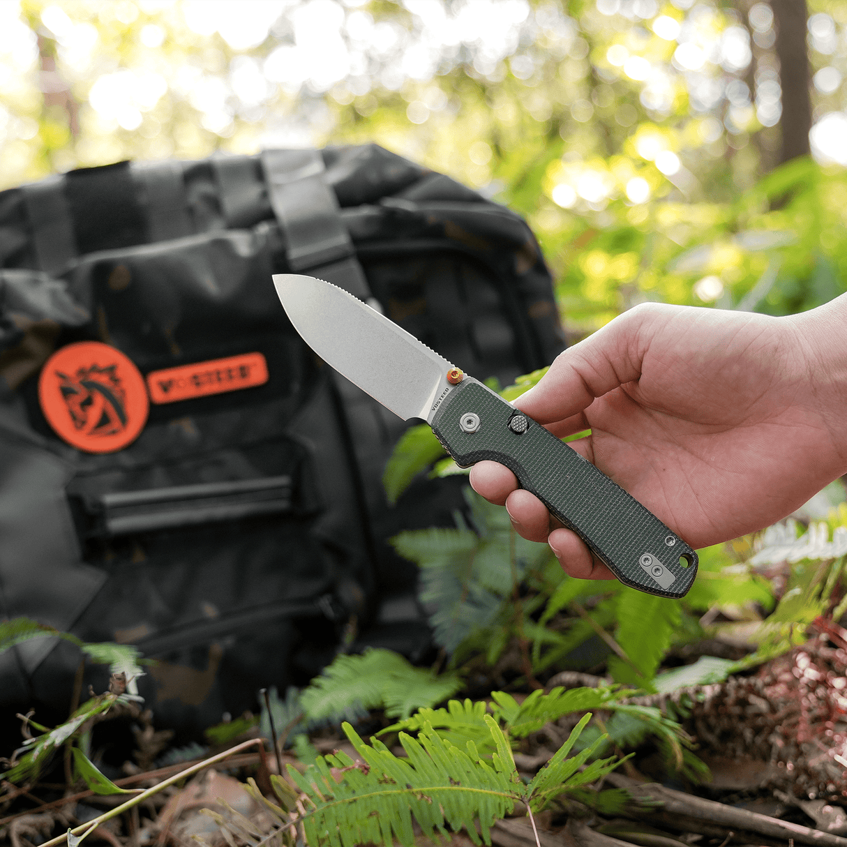 Raccoon 2.0 - Top Liner Lock | Green Micarta + 14C28N Drop Point - A2904