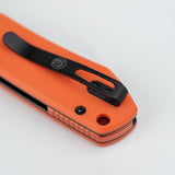 Raccoon 2.0 Top Liner Lock | Orange G10 + Blackwash 14C28N Sheepsfoot - A2931