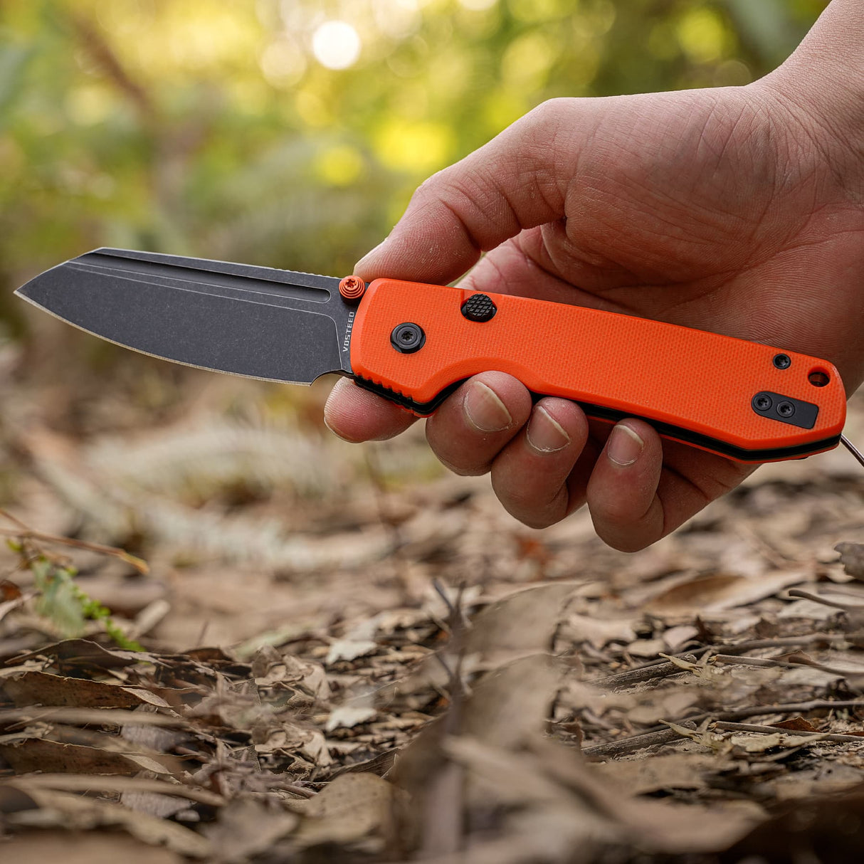 Raccoon 2.0 Top Liner Lock | Orange G10 + Blackwash 14C28N Sheepsfoot - A2931