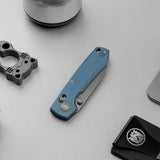 Raccoon TiSlim™ | Blue Ti + Stonewash 154CM